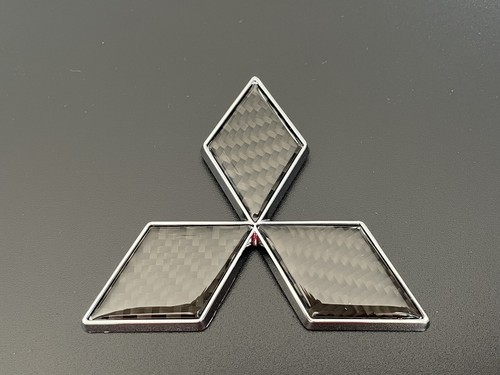 Carbon mitsubishi badge - carbon,